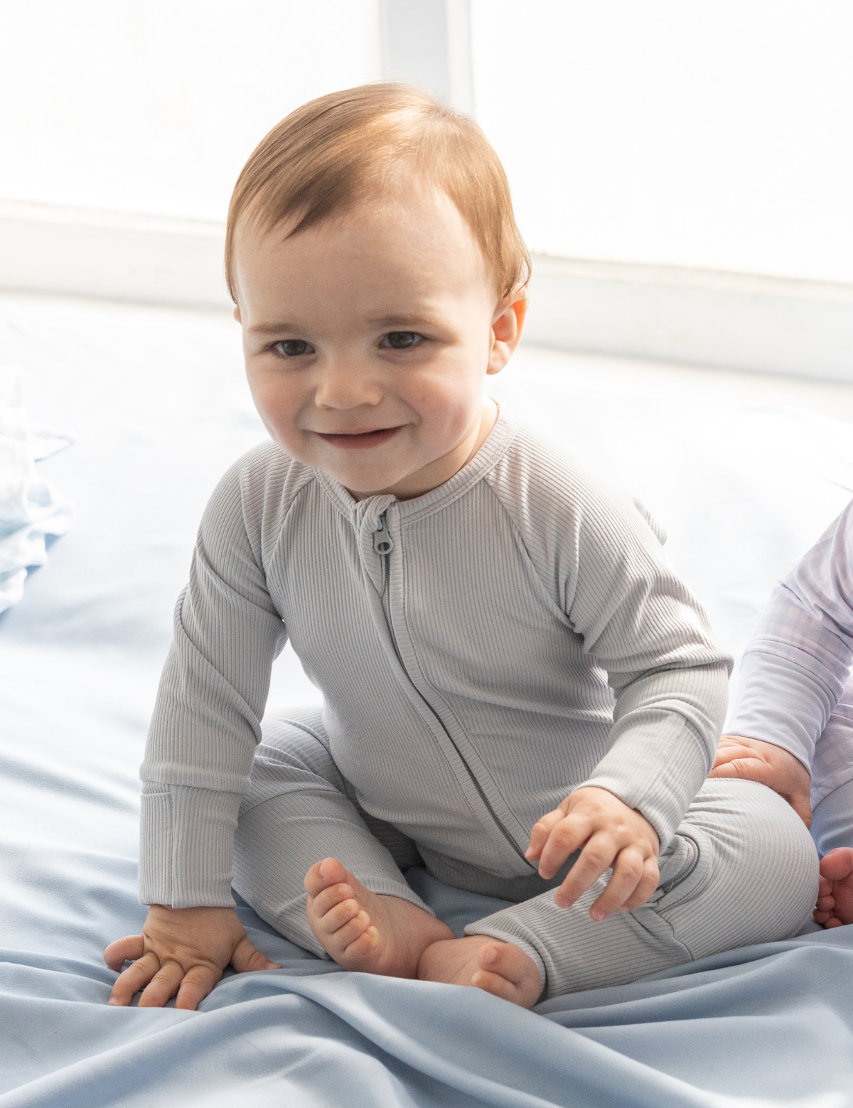 Baby blue ribbed bamboo baby zippy romper with two-way zip