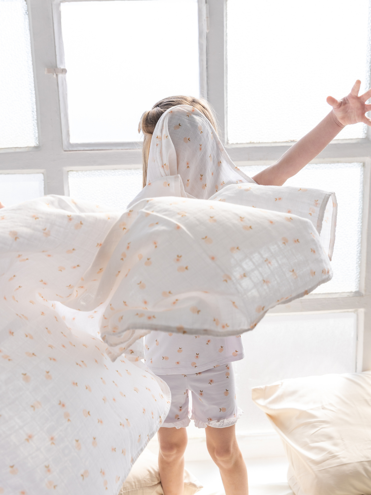 Peach print bamboo baby muslin swaddle