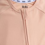 Coral ribbed bamboo baby sleepsuit with two-way zip