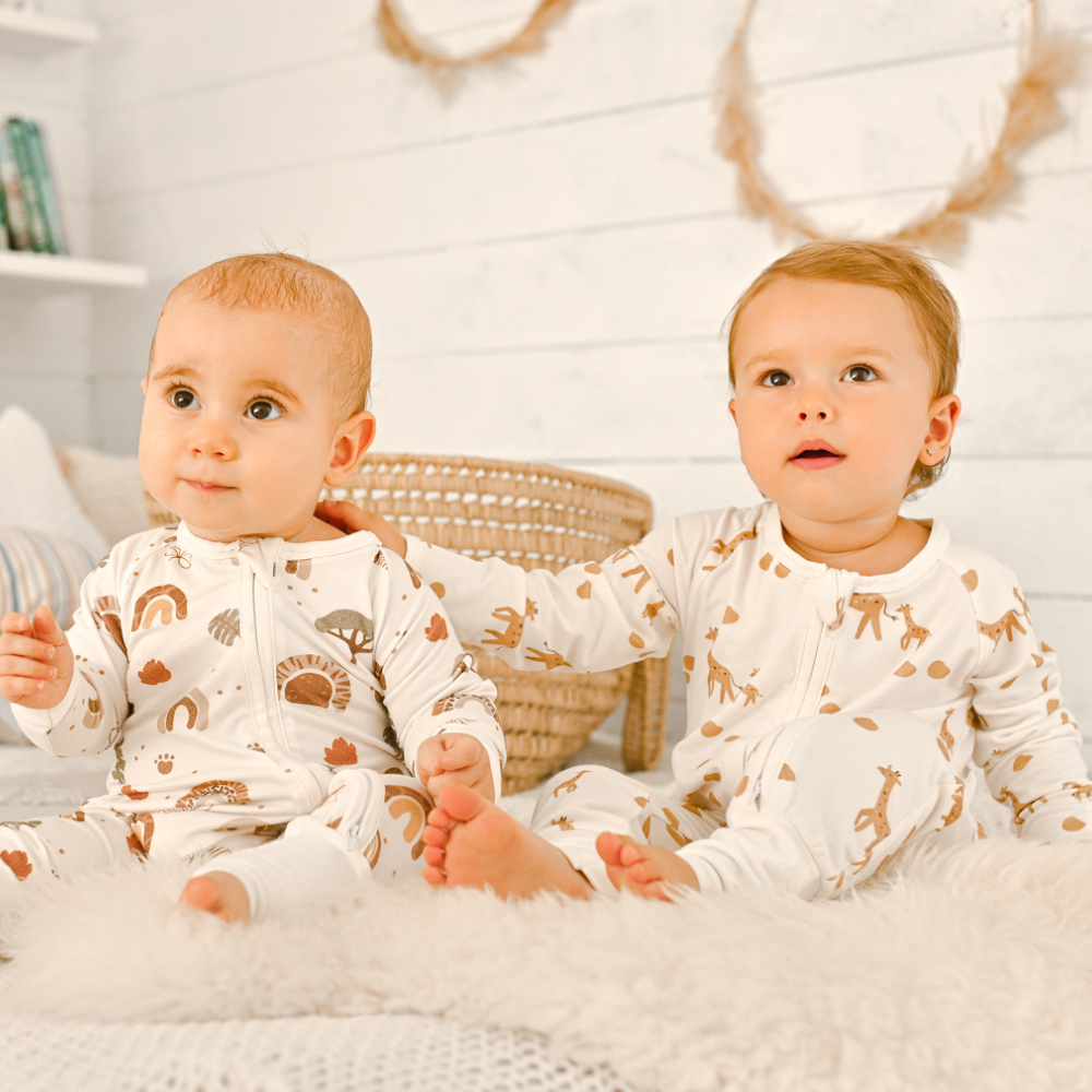 Giraffe print bamboo baby sleepsuit with two-way zip